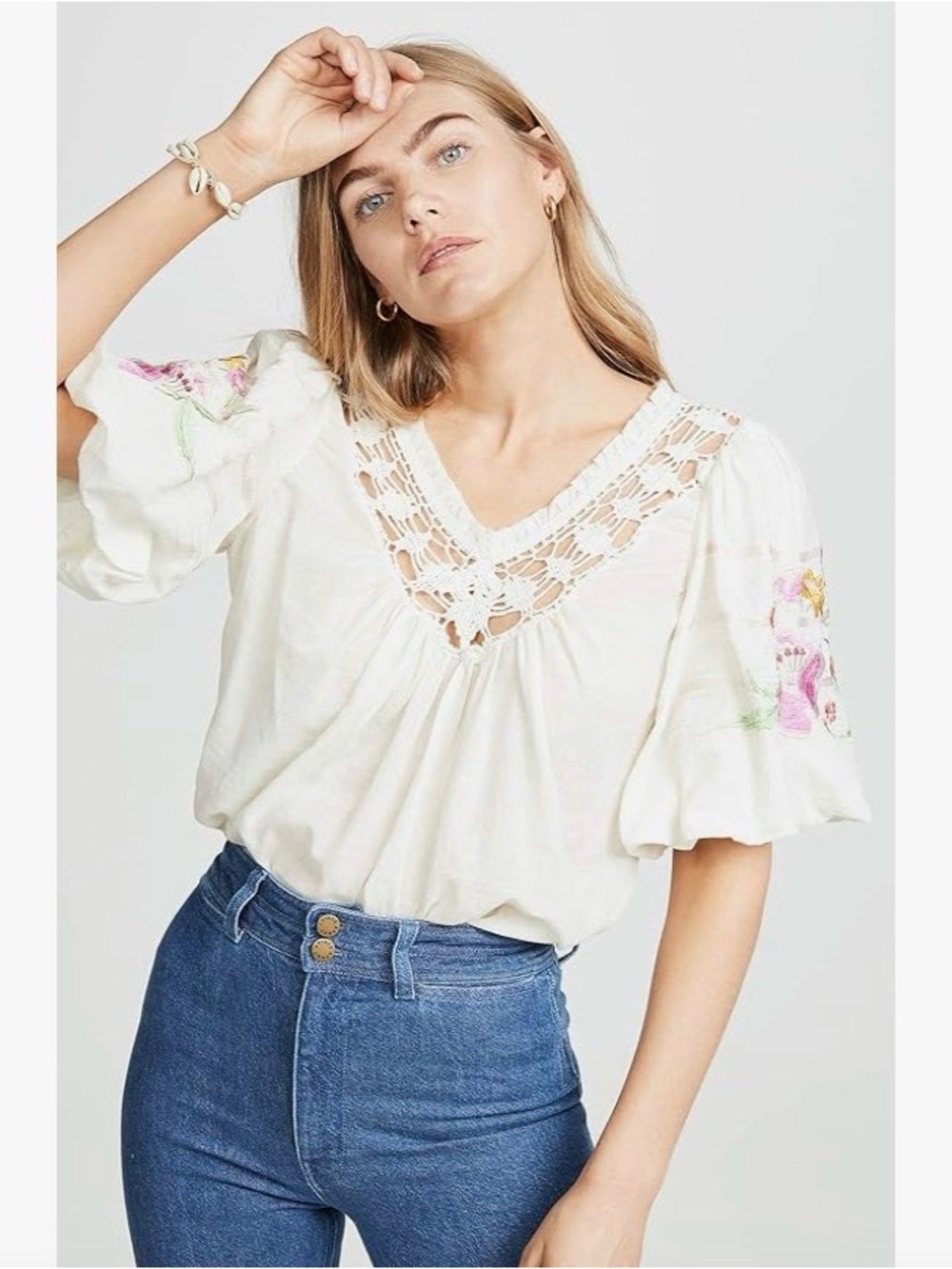Free People Bohemia embroidered peasant top with a crochet V-neckline